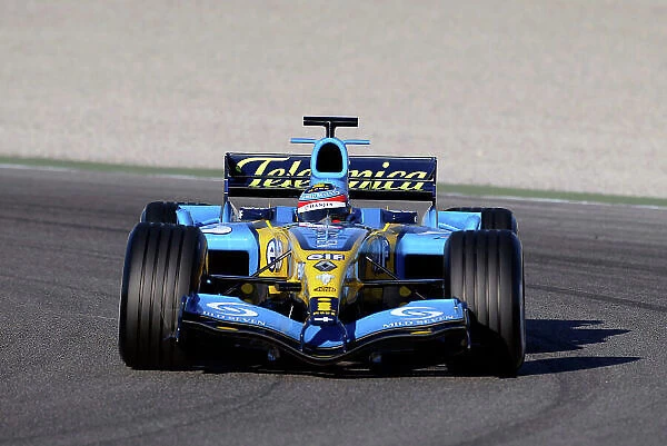2005 Formula One Testing Valencia, Spain. 25th January 2005 Fernando Alonso, takes to the track for the first test of the Renault R25, in its 2004 livery. World Copyright: Andrew Ferraro / LAT Photographic ref: Digital Image Only