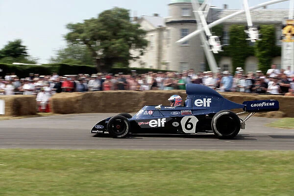 2005 Goodwood Festival of Speed Goodwood Estate, West Sussex. 24th - 26th June. David Coulthard performs in a Tyrrell 006 Cosworth in a helmet borrowed from Jenson Button. Action