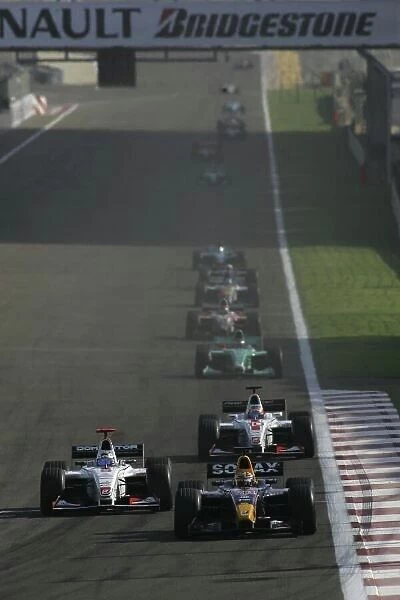 2005 GP2 Series - Bahrain Sakhir, Bahrain 28th-30th September 2005 Friday Race 2 Nicolas Lapierre (F, Arden International) defends from Nico Rosberg (D, ART Grand Prix) going into turn 1. Action
