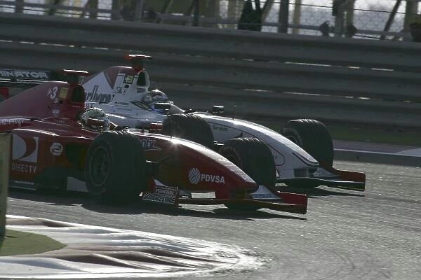 2005 GP2 Series - Bahrain Sakhir, Bahrain 28th-30th September 2005 Friday Race 2 Ernesto Viso (YV, BCN Competicion) defends from Nico Rosberg (D, ART Grand Prix). Action. Copyright: GP2 Series Media Service ref: Digital Image Only