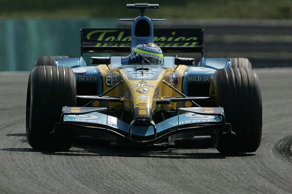 2005 Hungarian Grand Prix - Sunday Race, Hungaroring, Hungary. 31st July 2005 Giancarlo Fisichella, Renault R25, Action. World Copyright: Lorenzo Bellanca / LAT Photographic ref:Digital Image Only (a high res version is available on request)