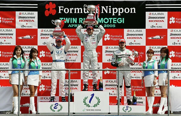 2005 Japanese Formula Three Championship Motegi, Japan. 3rd April 2005 Round 2 podium - (1st) winner Hideki Mutoh (Honda M_TEC), 2nd Joao Paulo de Oliveira (TOM'S) and 3rd Paolo Montin (ThreeBond)