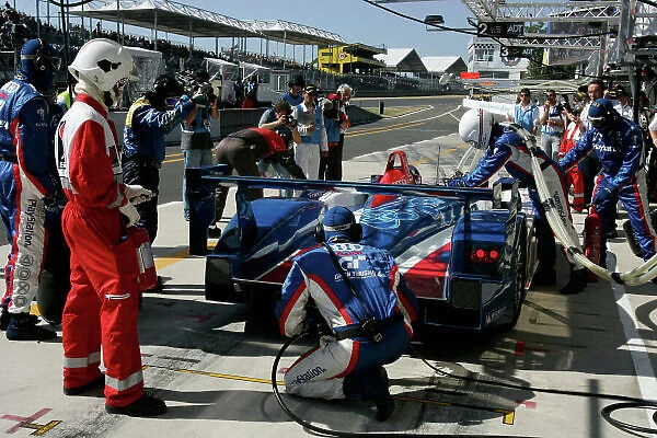 2005 Le Mans 24 Hours Le Mans, France. 17th - 18th June Franck Montagny (F) / Jean-Marc Gounon (F) / Stephane Ortelli (F) (no 4 Audi R8, Audi Playstation Team ORECA) comes into the pits for a driver change. Action