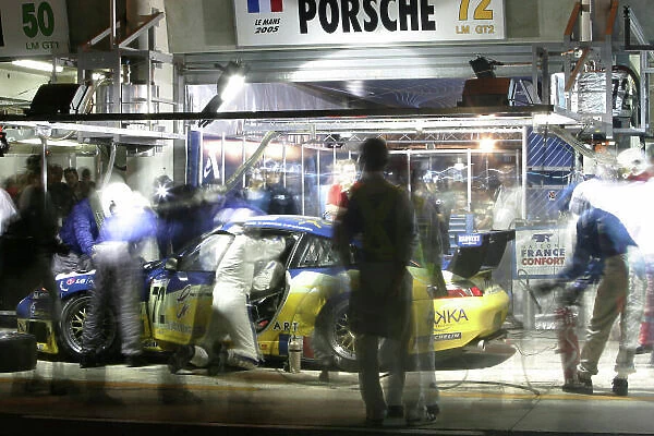 2005 Le Mans 24 Hours. Le Mans, France. 18th - 19th June. Luc Alphand (F) / Jerome Policand (F) / Christopher Campbell (F) (no 72 Porsche 911 GT3-RS, Luc Alphand Aventures) pits. Action