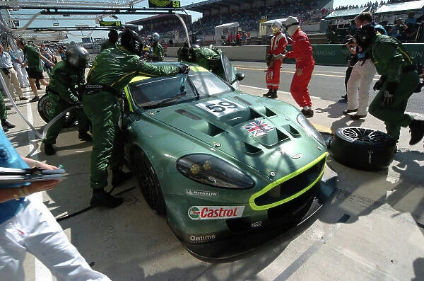 2005 Le Mans 24 Hours Le Mans, France. 17th - 18th June Peter Kox (NL) / Pedro Lamy (P) / Tomas Enge (CZ) (no 59 Aston Martin DBR9, Aston Martin Racing / Prodrive) comes in for a pit stop. Action