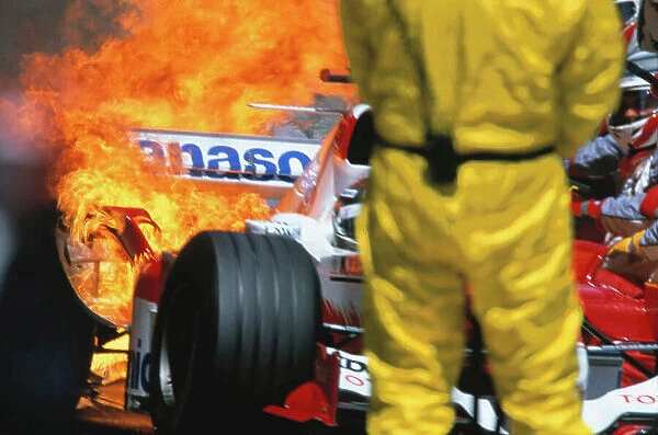 2005 Spanish Grand Prix Barcelona, Spain. 6th - 8th May 2005 Jarno Trulli's Toyota TF105, blasts out a ball of fire, as he exits the pits after a routine stop. He would carry on to finish 3rd