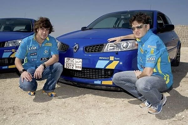 2006 Bahrain Fort, Manama, Bahrain-Preview. 8th March 2006. Renault F1 drivers Fernando Alonso and Giancarlo Fisichella at Bahrain fort with Renault Megane F1 team cars, Manama, Bahrain. Photos: Steven Tee /  LAT Photographic ref: Digital Image
