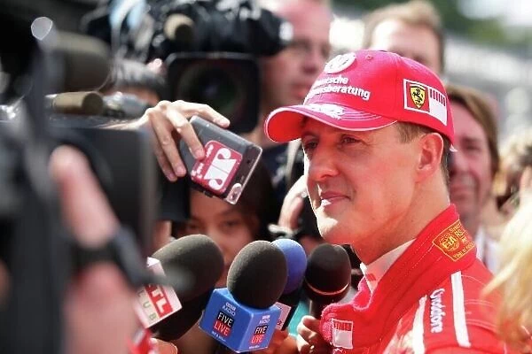 2006 Brazilian Grand Prix - Saturday Qualifying, Interlagos, Sao Paulo, Brazil. Michael Schumacher, Ferrari 248F1, is interviewed by the press, media