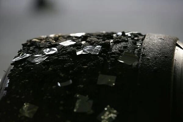 2006 Brazilian Grand Prix - Sunday Race Interlagos, Sao Paulo, Brazil. 19th - 22nd October 2006. Tyres with ticker-tape stuck to them after the race, detail. World Copyright: Charles Coates / LAT Photographic ref: Digital Image ZK5Y1070