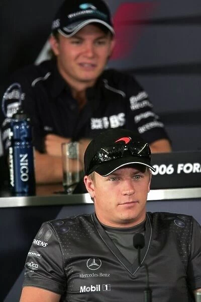 2006 Chinese Grand Prix - Thursday Preview Shanghai International Circuit, Shanghai, China. 28th September - 1st October 2006. Nico Rosberg, Williams FW28-Cosworth and Kimi Raikkonen, McLaren MP4 / 21-Mercedes-Benz, in the FIA press conference