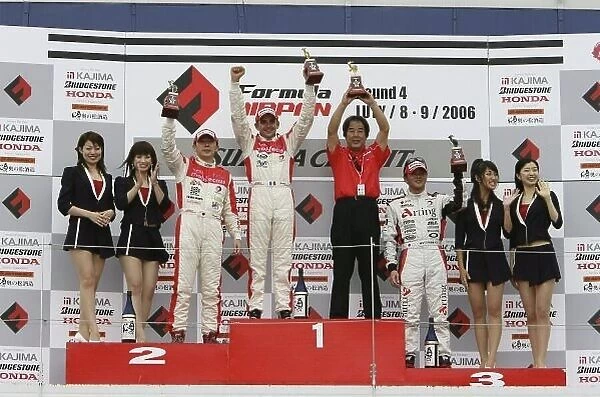 2006 Formula Nippon Championship Suzuka, Japan. 8th - 9th July 2006 Race podium - winner Benoit Treluyer (Mobilcast IMPUL), 1st position. Tsugio Matsuda (2nd position) and Satoshi Motoyama (3rd position). World Copyright