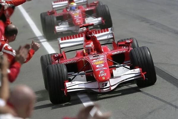 2006 German Grand Prix - Sunday Race Hockenheim, Germany. 27th - 30th July. Michael Schumacher, Ferrari 248F1, 1st position, leads Felipe Massa, Ferrari 248F1, 2nd position, at the finish