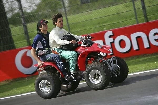 2006 GP2 Series. Round 2. Imola, Italy. 20th April 2006. Thursday Preview. Alexandre Negrao (BRA, Piquet Sports) and Nelson Piquet Jr. (BRA, Piquet Sports) inspect the track. Action