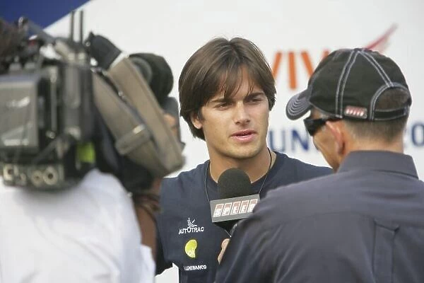 2006 GP2 Series.Round 11. Monza, Italy. 7th September 2006. Thursday Preview. Nelson Piquet Jr. (BRA, Piquet Sports) gives an interview to Peter Windsor of Speed TV. World Copyright: Andrew Ferraro / GP2 Series Media Service