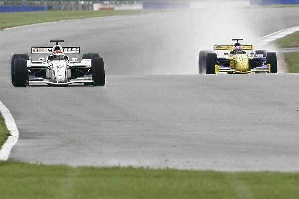 2006 Grand Prix Masters. Silverstone, England. 11th - 13th August. Eddie Cheever battles for the lead with Eric Van De Poele. Action World Copyright: Drew Gibson / LAT Photographic. Ref: Digital Image Only