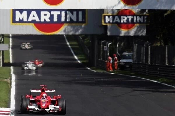 2006 Italian Grand Prix - Sunday Race Autodromo Nazionale Monza, Italy. 7th - 10th September 2006. Michael Schumacher, Ferrari 248F1, 1st position, leads Robert Kubica, Sauber F1. 06-BMW, 3rd position, Felipe Massa, Ferrari 248F1, 9th position