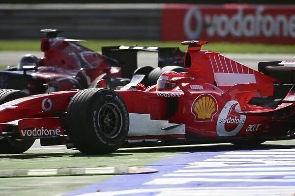 2006 Italian Grand Prix - Sunday Race Autodromo Nazionale Monza, Italy. 7th - 10th September 2006. Michael Schumacher, Ferrari 248F1, 1st position, passes Scott Speed, Toro Rosso STR01-Cosworth, 13th position