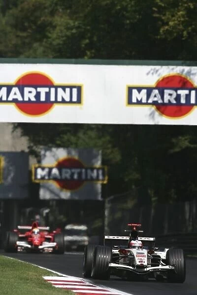 2006 Italian Grand Prix - Sunday Race Autodromo Nazionale Monza, Italy. 7th - 10th September 2006. Rubens Barrichello, Honda RA106, 6th position, leads Felipe Massa, Ferrari 248F1, 9th position