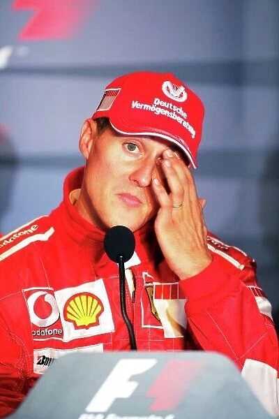 2006 Italian Grand Prix - Sunday Race, Monza, Italy. Michael Schumacher, Ferrari 248F1, tells the world about his impending retirement from Formula 1