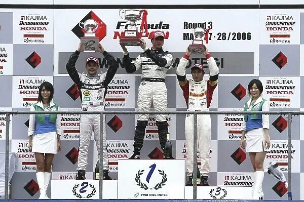 2006 Japanese Formula Three Championship Twin-Ring Motegi, Japan. 28th May 2006 Round 6 podium - winner Adrian Sutil (dallara F305) 1st position, Fabio Carbone (Dallarta F305) 2nd position and Kodai Tsukakoshi (Dome F107)