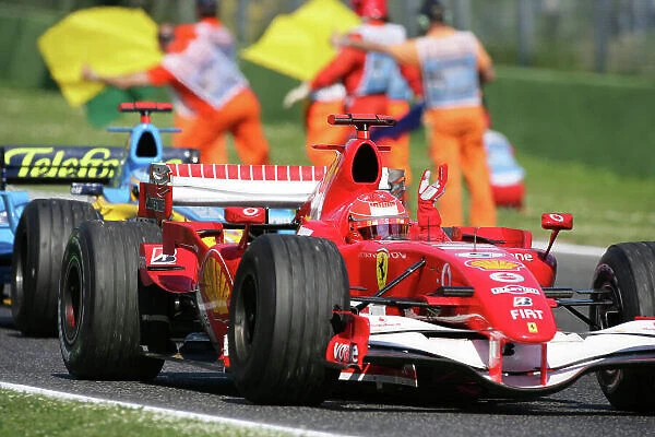 2006 San Marino Grand Prix - Sunday Race Imola, Italy. 20th - 23rd April 2006 Michael Schumacher, Ferrari 248F1, 1st position, leads Fernando Alonso, Renault R26, 2nd position, action