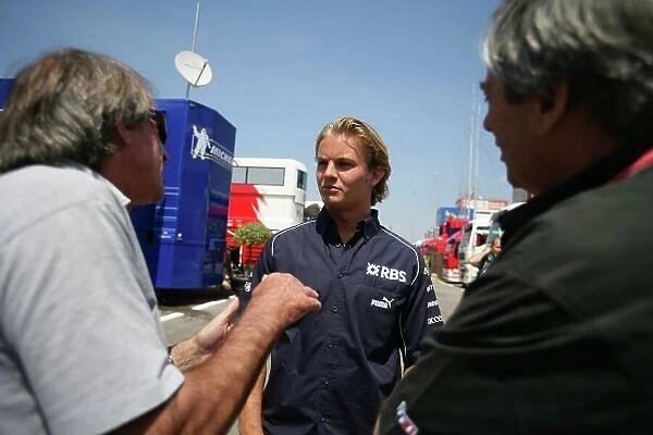 2006 Spanish Grand Prix - Thursday Preview Circuit de Catalunya, Barcelona, Spain. 11th - 14th May 2006 Nico Rosberg, Williams FW28 Cosworth with Jacques Laffite and journalist Jean Louis Monsette. World Copyright: Glenn Dunbar / LAT Photographic ref