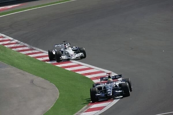 2006 Turkish Grand Prix - Sunday Race Istanbul Park, Istanbul, Turkey. 24th - 27th August. Mark Webber, Williams FW28-Cosworth, 10th position, leads Robert Kubica, Sauber F1.06-BMW, 12th position, action, portrait
