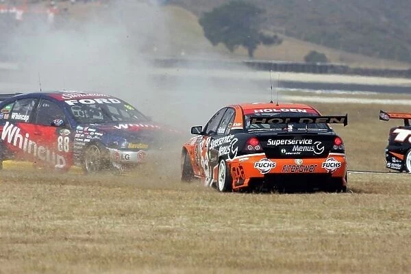 2006 V8 Supercar Championship Phillip Island, Melbourne, Victoria. 8th - 10th December. Jason Richards (Tasman Motorsport Holden Commodore VZ) and Jamie Whincup (Team Betta Electrical Holden Commodore VZ) collide