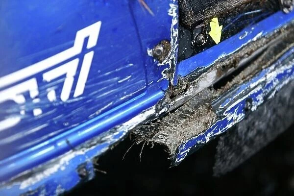 2006 World Rally Championship. Round 16, Wales Rally GB. 1st - 3rd December 2006. Damage on the front bumper of Petter Solberg / Phil Mills. Subaru Impreza WRC. Atmosphere