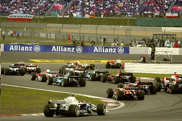 2007 European Grand Prix - Sunday Race: Fernando Alonso, McLaren MP4-22 Mercedes, 1st position, leads Lewis Hamilton, McLaren MP4-22 Mercedes