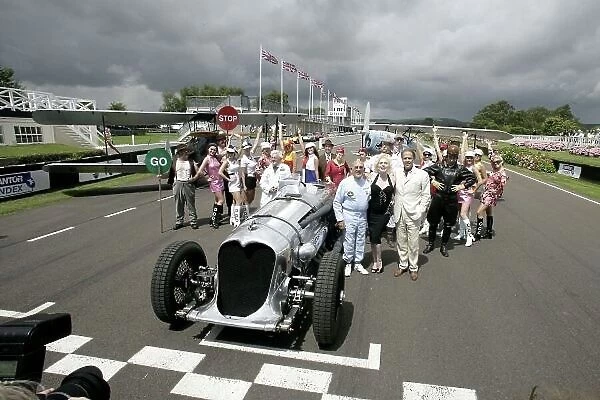 2007 Goodwood Revival Press Day. Goodwood, West Sussex. 18th July 2007. Sir Stirling Moss, Marilyn Monroe and Lord March, with The Essolube Girls, by a Napier Railton and 2 byplanes. World Copyright: Gary Hawkins / LAT Photographic