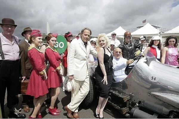 2007 Goodwood Revival Press Day. Goodwood, West Sussex. 18th July 2007. Sir Stirling Moss, Marilyn Monroe and Lord March, with The Essolube Girls, by a Napier Railton and 2 bi-planes. World Copyright: Gary Hawkins / LAT Photographic