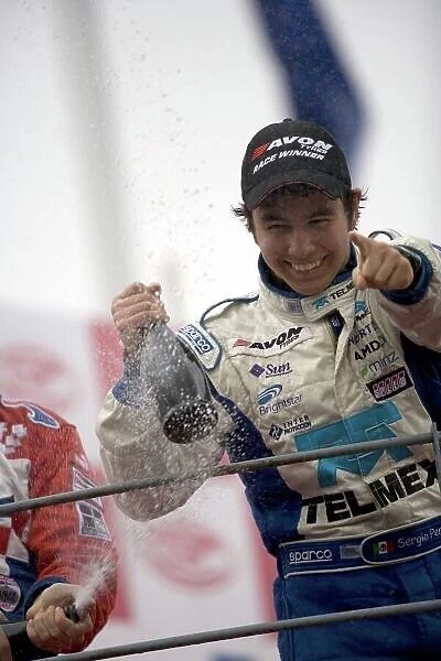 2008 British Formula Three Championship. Monza, Italy. 16th - 18th May 2008. Sergio Perez, T-Sport celebrates victory on the podium. Portrait. World Copyright: Drew Gibson / LAT ref: Digital Image _Y2Z2231