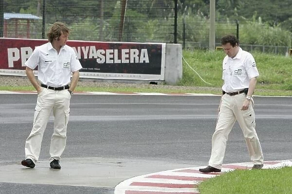 2008 GP2 Asia Series. Friday Preview. Round 2 - Sentul International Circuit, Indonesia. Friday 15th February. Marco Codello (Director of Operations) and Didier Perrin, (Technical Director) walk the track