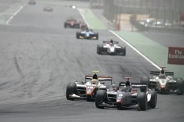 2008 GP2 Asia Series. Saturday Race. Dubai. Dubai Autodrome. 12th April. Jerome D'Ambrosio (BEL, Dams) and Ho - Pin Tung (CHN, Trident Racing) battle for position. Action. World Copyright: Alastair Staley / GP2 Series Media Service