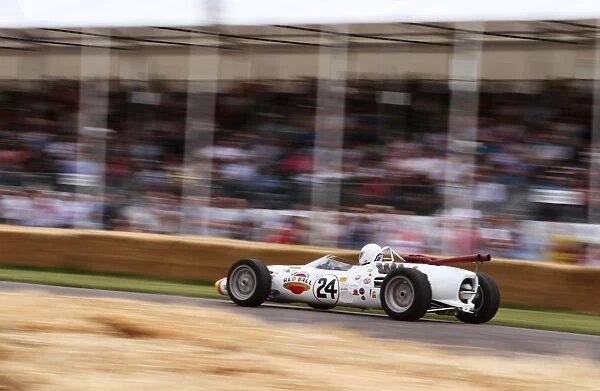 2011 Goodwood Festival of Speed: Lola T90 driven by Graham Hill to win the Indy 500 in 1966. Action