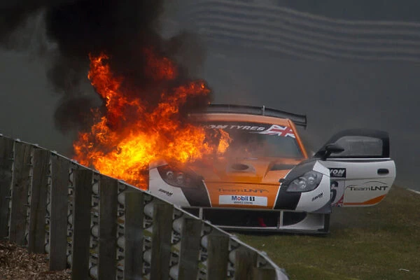 fire. 2013 British GT Championship,. The Ginetta of Richard Sykes / Mike