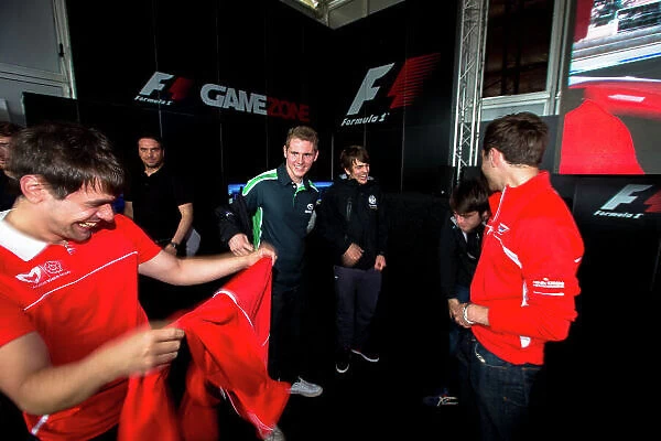 2013 GP3 Series. Round 3. Silverstone, Northamptonshire, England. 28th June 2013. Friday. GP3 Drivers make a guest appearance at Gamezone. Ryan Cullen (GBR) Marussia Manor Racing Josh Webster (GBR) Status Grand Prix Lewis Williamson (GBR)