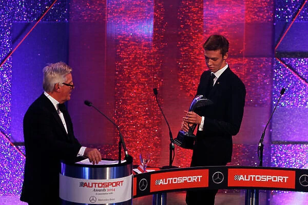 2014 Autosport Awards. Grosvenor House Hotel, Park Lane, London. Sunday 7 December 2014. Daniil Kvyat receives Rookie of the Year award. World Copyright: Sam Bloxham / LAT Photographic. ref: Digital Image _14P3895