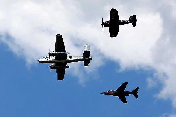2014 Formula One Austrian Grand Prix, Red Bull Ring, Spielberg, Styria, Austria, 19th - 22nd June 2014. The Flying Bulls fly over the circuit with their North American B-25J Mitchell leading their Chance-Vought F4U-4 Corsair