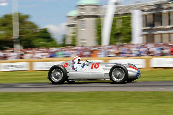 2014 Goodwood Festival of Speed Goodwood Estate, West Sussex, England. 26th - 29th June 2014. Sunday 29 June 2014. Jackie Stewart Drives the Mercedes Benz W165. World Copyright: Adam Warner / LAT Photographic. ref: Digital Image _L5R6950