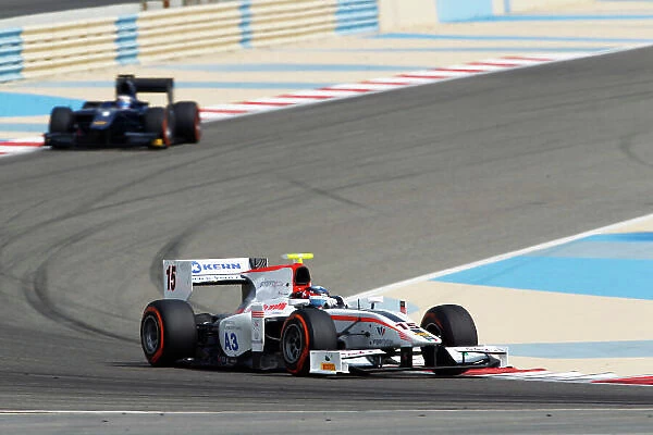 2014 GP2 Series Test 2 Bahrain International Circuit, Bahrain Thursday 20 March 2014. Simon Trummer (SUI, Rapax), followed by Mitch Evans (NZL, RT RUSSIAN TIME) World Copyright: Sam Bloxham / LAT Photographic. ref: Digital Image _G7C5361