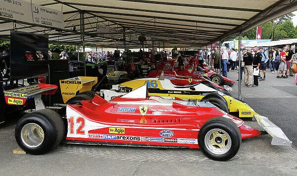 2015 Goodwood Festival of Speed. Goodwood Estate, West Sussex, England. 25th - 28th June 2015. Gilles Villeneuve's Ferrari 312T4 and Rene Arnoux's Renault RS10, parked as if to recreate their famous battle in the 1979 French Grand Prix