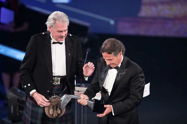 2017 Autosport Awards Grosvenor House Hotel, Park Lane, London. Sunday 3 December 2017. Nelson Piquet collects his Gregor Grant Award on stage with Gordon Murray. World Copyright: Joe Portlock / LAT Images ref: Digital Image _R3I6486