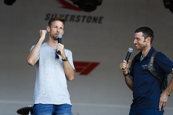 2018 British GP: SILVERSTONE, UNITED KINGDOM - JULY 05: Guy Martin talks to Jenson Button on stage during the British GP at Silverstone on July 05