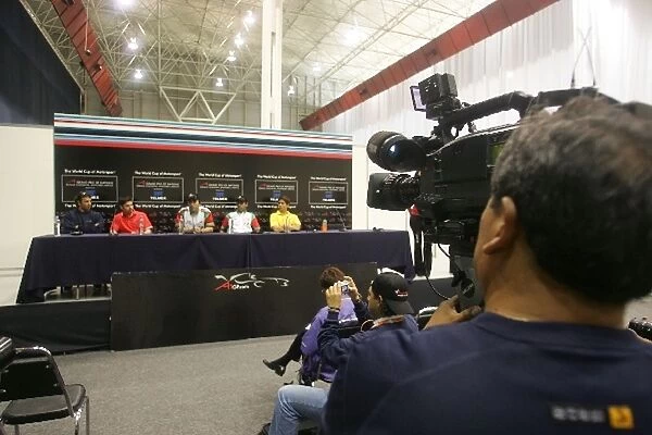 A1 Grand Prix: A cameraman shoots the press conference