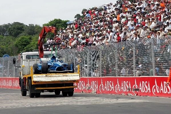 A1 Grand Prix: The car of Massimiliano Busnelli A1 Team Italy is taken away on a truck