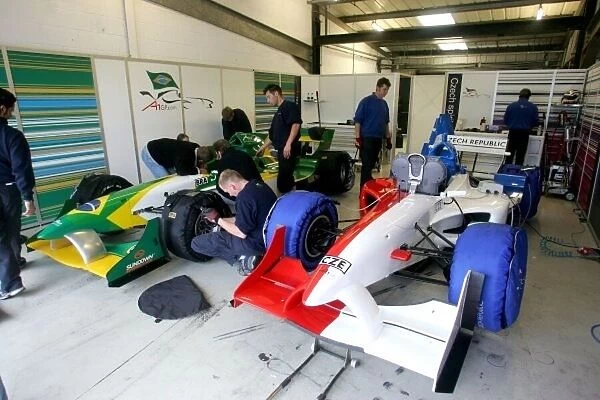 A1GP. A1 Team Czech Republic and A1 Team Brazil share a garage.