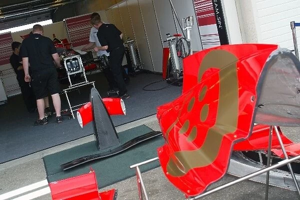 A1GP: A1 Team Singapore mechanics prepare for their debut race