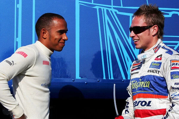 GP2. Adam Carroll (GBR) Racing Engineering talks with Lewis Hamilton (GBR)